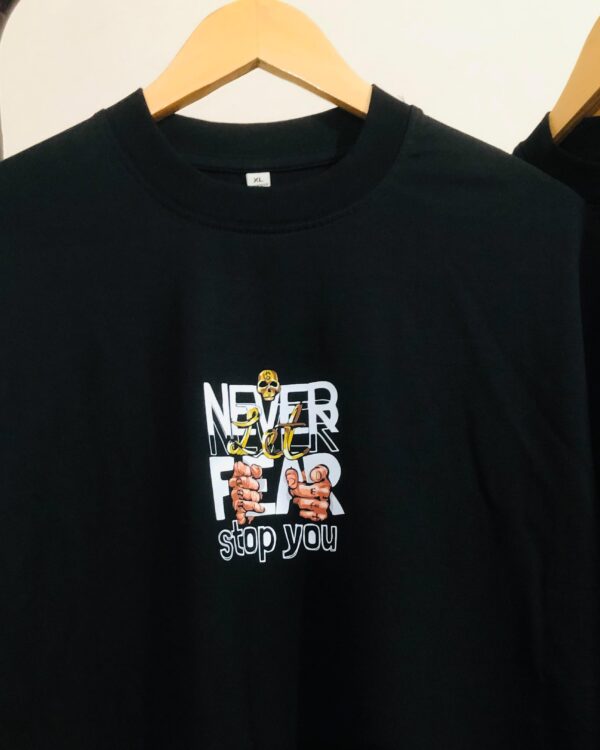 “NEVER FEAR” OVERSIZED DROP.